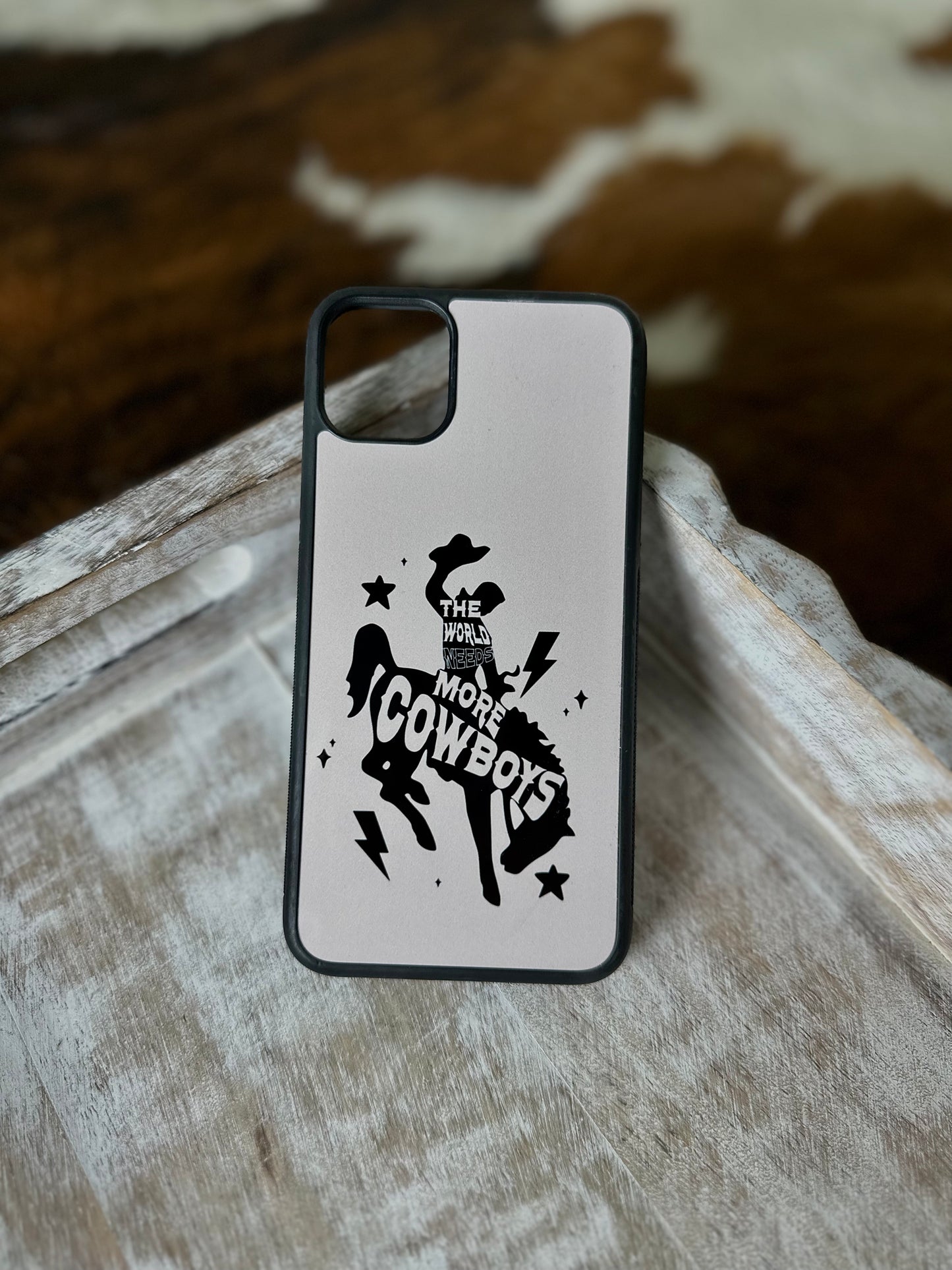 The world needs more cowboys phone case